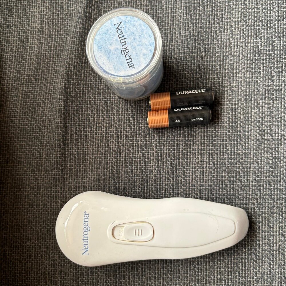 Used Neutrogena Microdermabrasion System with 11 Puffs